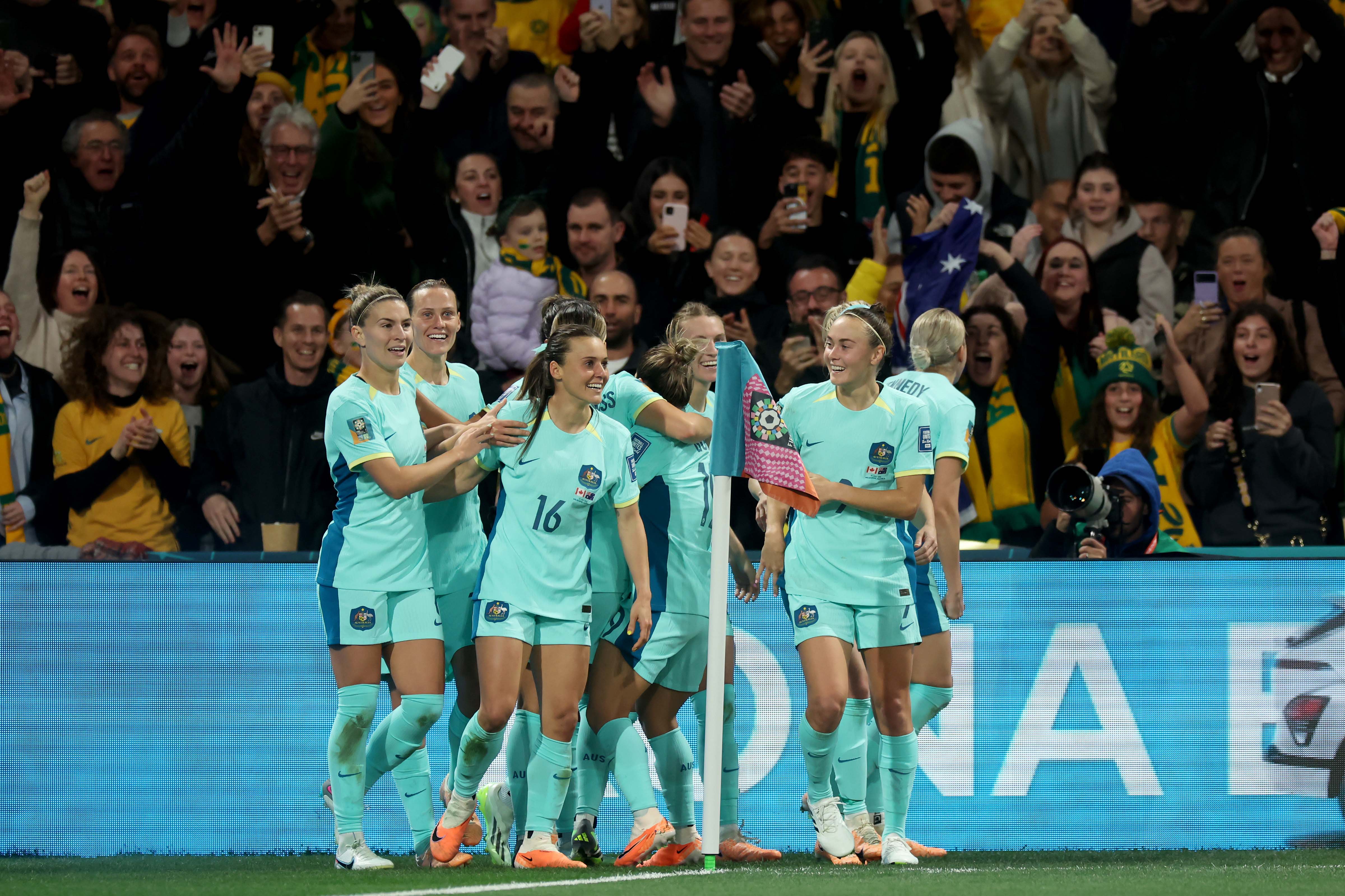 Hayley Raso (3rd L) of Australia celebrates with teammates after scoring her team's second goal during the FIFA Women's World Cup Australia & New Zealand 2023 Group B match between Canada and Australia at Melbourne Rectangular Stadium on July 31, 2023 in Melbourne, Australia. (Photo by Alex Grimm - FIFA/FIFA via Getty Images)