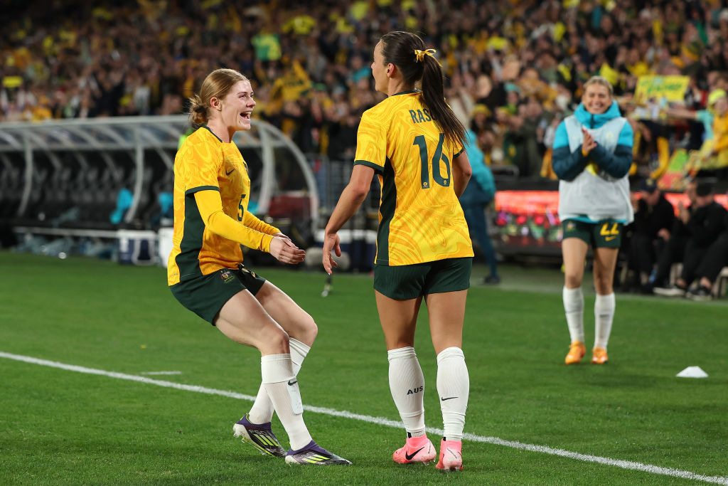 SYDNEY, AUSTRALIA - JUNE 03: Hayley Raso of Australia celebrates with Cortnee Vine of Australia afterscoring a goal during the international friendly match between Australia Matildas and China PR at Accor Stadium on June 03, 2024 in Sydney, Australia. (Photo by Mark Metcalfe/Getty Images)
