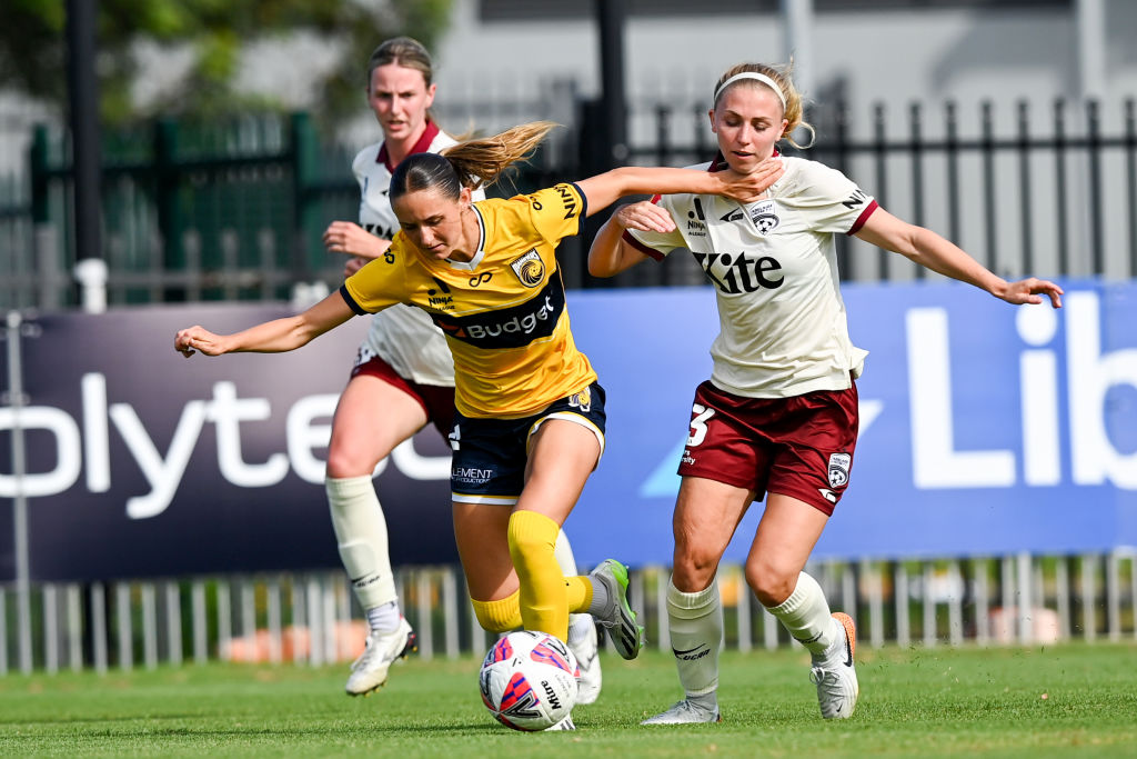 CENTRAL COAST, AUSTRALIA - JANUARY 04: Jessika Nash (L) of the Mariners and Fiona Worts (R) of Adelaide United compete for the ball during the round 10 A-League Women's match between Central Coast Mariners and Adelaide United at Woy Woy Oval, on January 04, 2025, in Central Coast, Australia. (Photo by Izhar Khan/Getty Images)