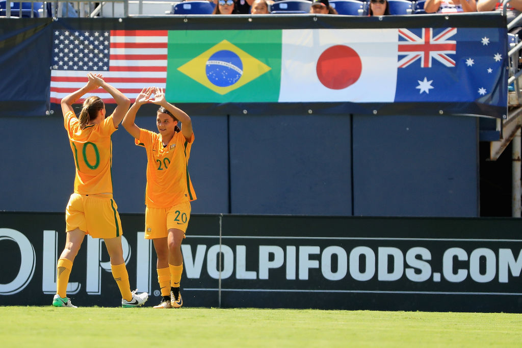 Emily van Egmond and Sam Kerr celebrate at the 2017 Tournament of Nations