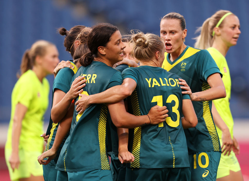  Sam Kerr #2 of Team Australia celebrates with team mates after scoring their side's second goal during the Women's First Round Group G match between Sweden and Australia on day one of the Tokyo 2020 Olympic Games at Saitama Stadium on July 24, 2021 in Saitama, Japan. (Photo by Francois Nel/Getty Images)