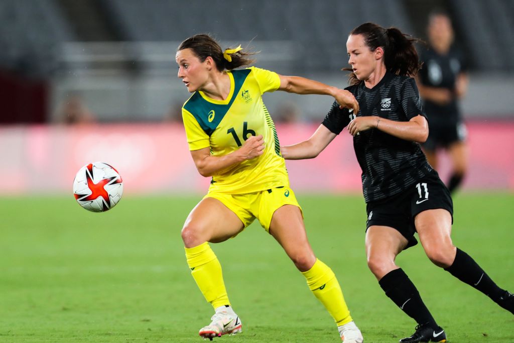 Australia's forward Hayley Raso (L) works around New Zealand's midfielder Olivia Chance during the Tokyo 2020 Olympic Games women's group G first round football match between Australia and New Zealand at the Tokyo Stadium in Tokyo on July 21, 2021. (Photo by Yoshikazu TSUNO / AFP) (Photo by YOSHIKAZU TSUNO/AFP via Getty Images)