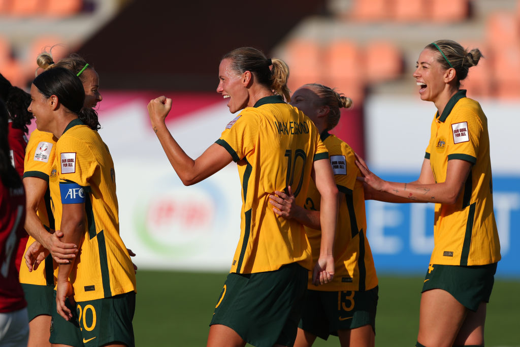 Emily van Egmond (3rd R) of Australia celebrates scoring her side's thirteenth goal with her team mates during the AFC Women's Asian Cup Group B match between Australia and Indonesia at Mumbai Football Arena on January 21, 2022 in Mumbai, India. (Photo by Thananuwat Srirasant/Getty Images)Emily van Egmond (3rd R) of Australia celebrates scoring her side's thirteenth goal with her team mates during the AFC Women's Asian Cup Group B match between Australia and Indonesia at Mumbai Football Arena on January 21,