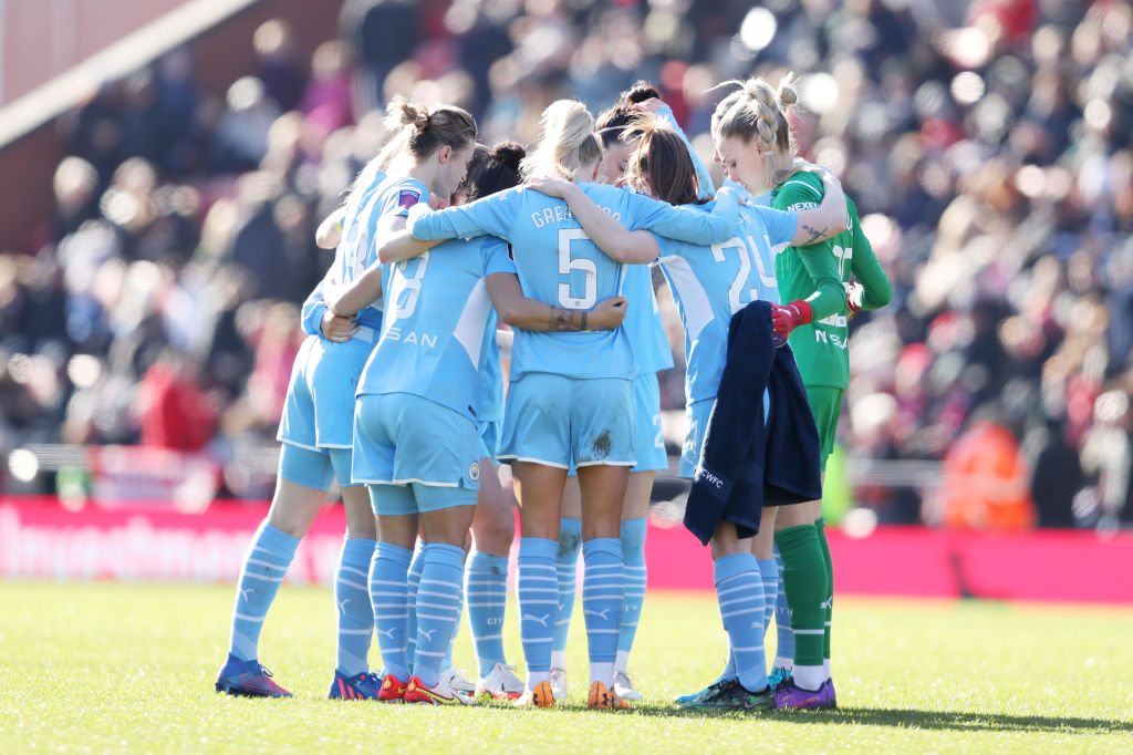 Manchester City players enter a huddle before the second half during the Vitality Women's FA Cup Fifth Round match between Manchester United and Manchester City at Leigh Sports Village on February 27, 2022 in Leigh, England. (Photo by Charlotte Tattersall/Getty Images)