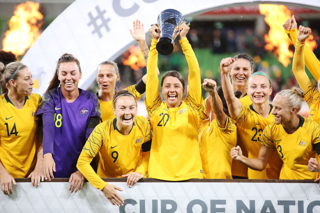 Sam Kerr of the Matildas lifts up the trophy and celebrates the win with teammates during the Cup of Nations match between Australia and Argentina at AAMI Park on March 06, 2019 in Melbourne, Australia. (Photo by Michael Dodge/Getty Images)
