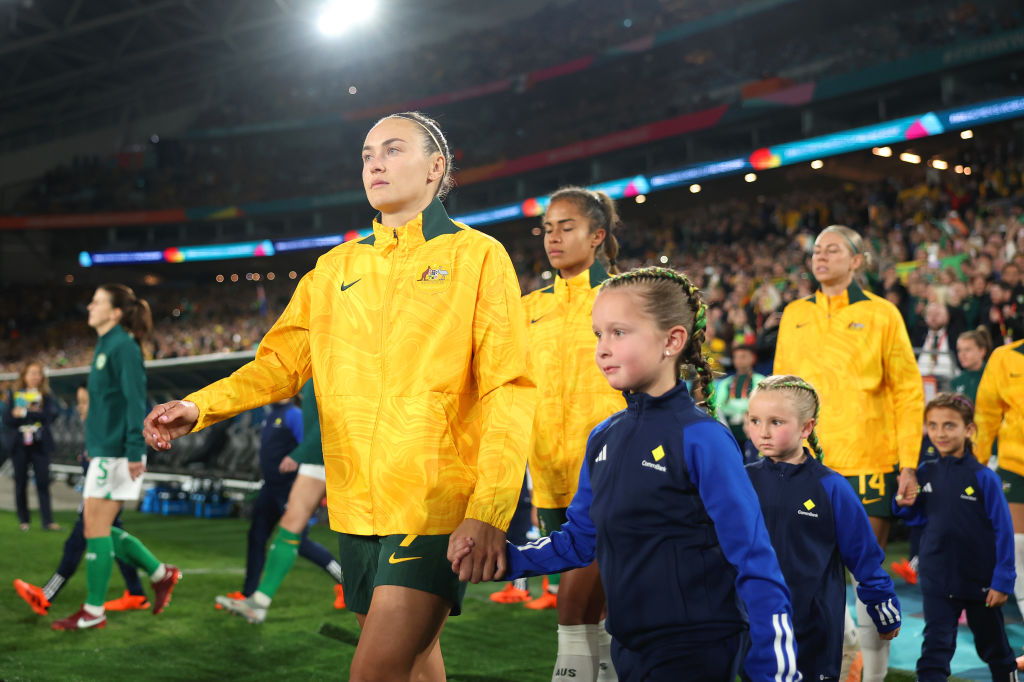 Caitlin Foord of Australia walks into the pitch prior to the FIFA Women's World Cup Australia & New Zealand 2023 Group B match between Australia and Ireland at Stadium Australia on July 20, 2023 in Sydney, Australia. (Photo by Cameron Spencer/Getty Images)