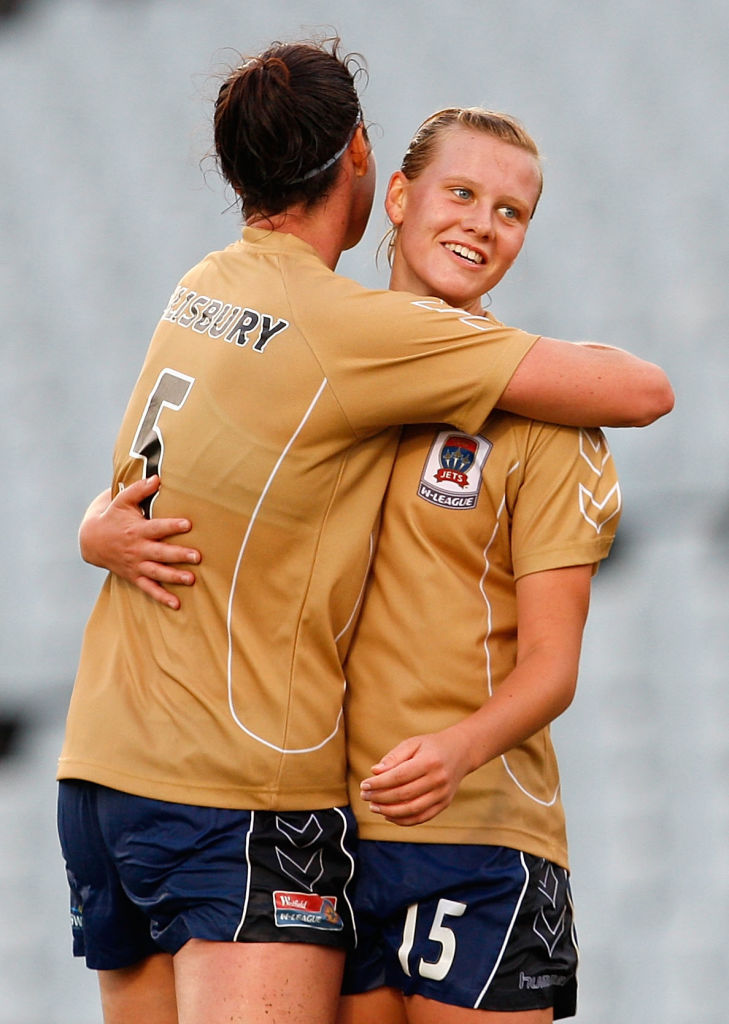 Cheryl Salisbury of the Jets congratulates team mate Emily Van Egmond after scoring a goal during the round six W-League match between the Central Coast Mariners and the Newcastle Jets at Campbelltown Stadium on November 29, 2008 in Sydney, Australia. (Photo by Cameron Spencer/Getty Images)