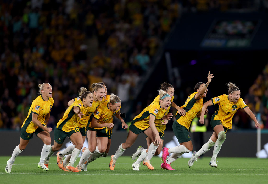 Players of Australia celebrate their side's victory in the penalty shoot out after Cortnee Vine of Australia scores her team's tenth penalty in the penalty shoot out during the FIFA Women's World Cup Australia & New Zealand 2023 Quarter Final match between Australia and France at Brisbane Stadium on August 12, 2023 in Brisbane, Australia. (Photo by Elsa - FIFA/FIFA via Getty Images)