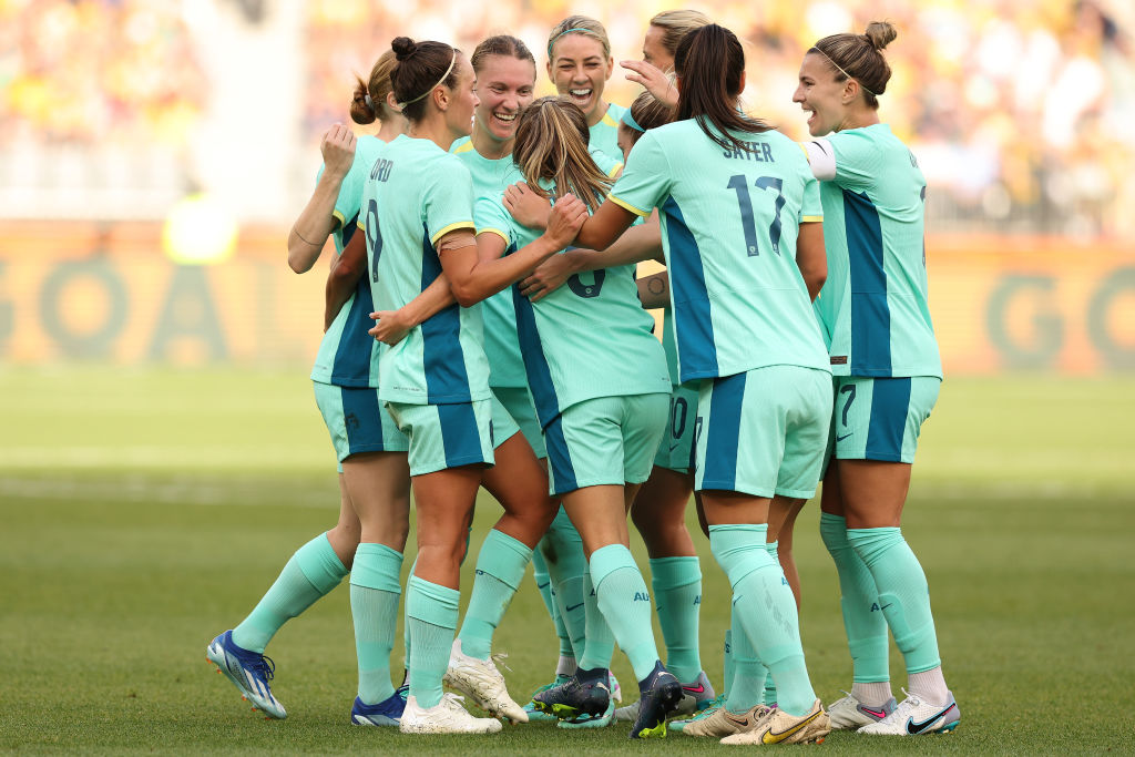 Clare Wheeler of the Matildas celebrates with team mates after scoring a goal during the AFC Women's Asian Olympic Qualifier match between Philippines and Australia Matildas at Optus Stadium on October 29, 2023 in Perth, Australia. (Photo by Will Russell/Getty Images)