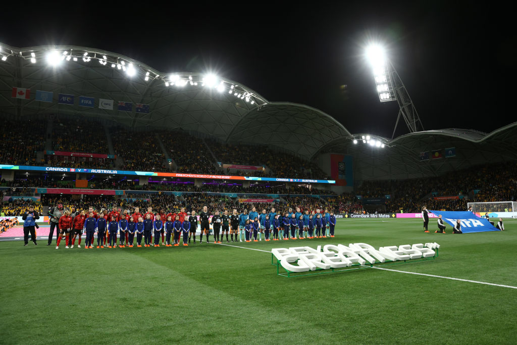 Players and match officials line up prior to the FIFA Women's World Cup Australia & New Zealand 2023 Group B match between Canada and Australia at Melbourne Rectangular Stadium on July 31, 2023 in Melbourne, Australia. (Photo by Robert Cianflone/Getty Images)