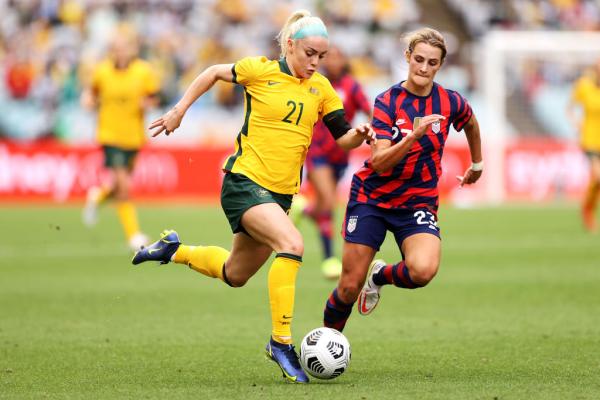 Ellie Carpenter of the Matildas runs with the ball during game one of the series International Friendly series between the Australia Matildas and the United States of America Women's National Team at Stadium Australia on November 27, 2021 in Sydney, Australia. (Photo by Mark Kolbe/Getty Images)