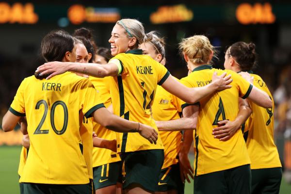 Sam Kerr and Alanna Kennedy of the Matlidas celebrate as Clare Polkinghorne of the Matlidas celebrates with her team mates afterscoring a goal during the Women's International Friendly match between the Australia Matildas and Brazil at CommBank Stadium on October 23, 2021 in Sydney, Australia.