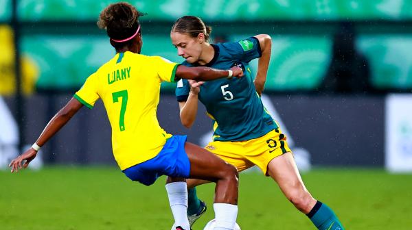 Young Matildas fall to Brazil in wet and wild World Cup encounter