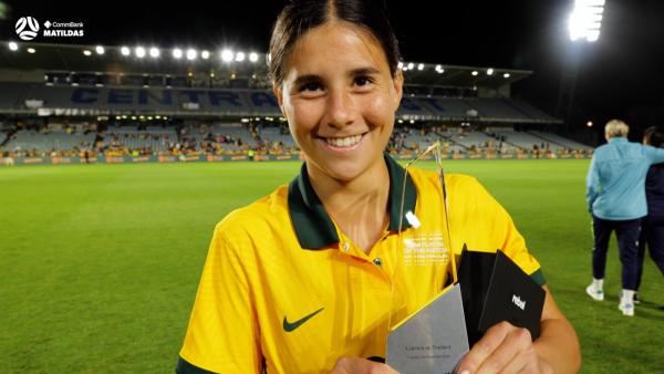 Kyra Cooney-Cross is presented with the Rebel Sport Player of the Match for AUSvTHA