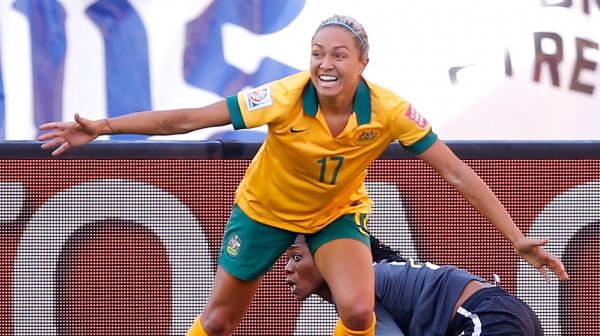 Kyah Simon celebrates one of her two goals against Nigeria.