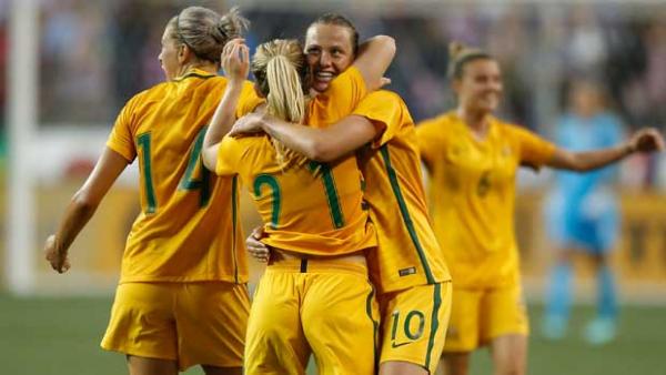 The Westfield Matildas celebrate after their history-making win over the USA at the Tournament of Nations.